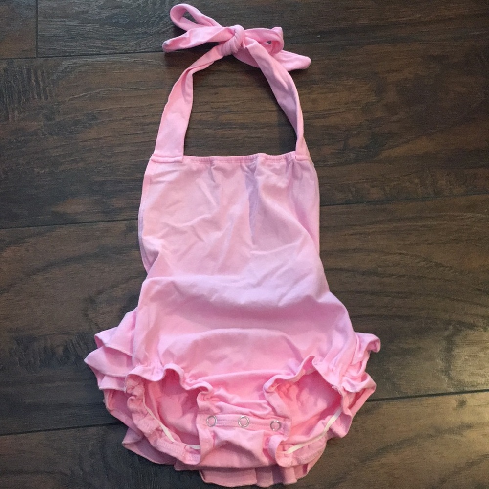 Pink baby bubble with ruffled back